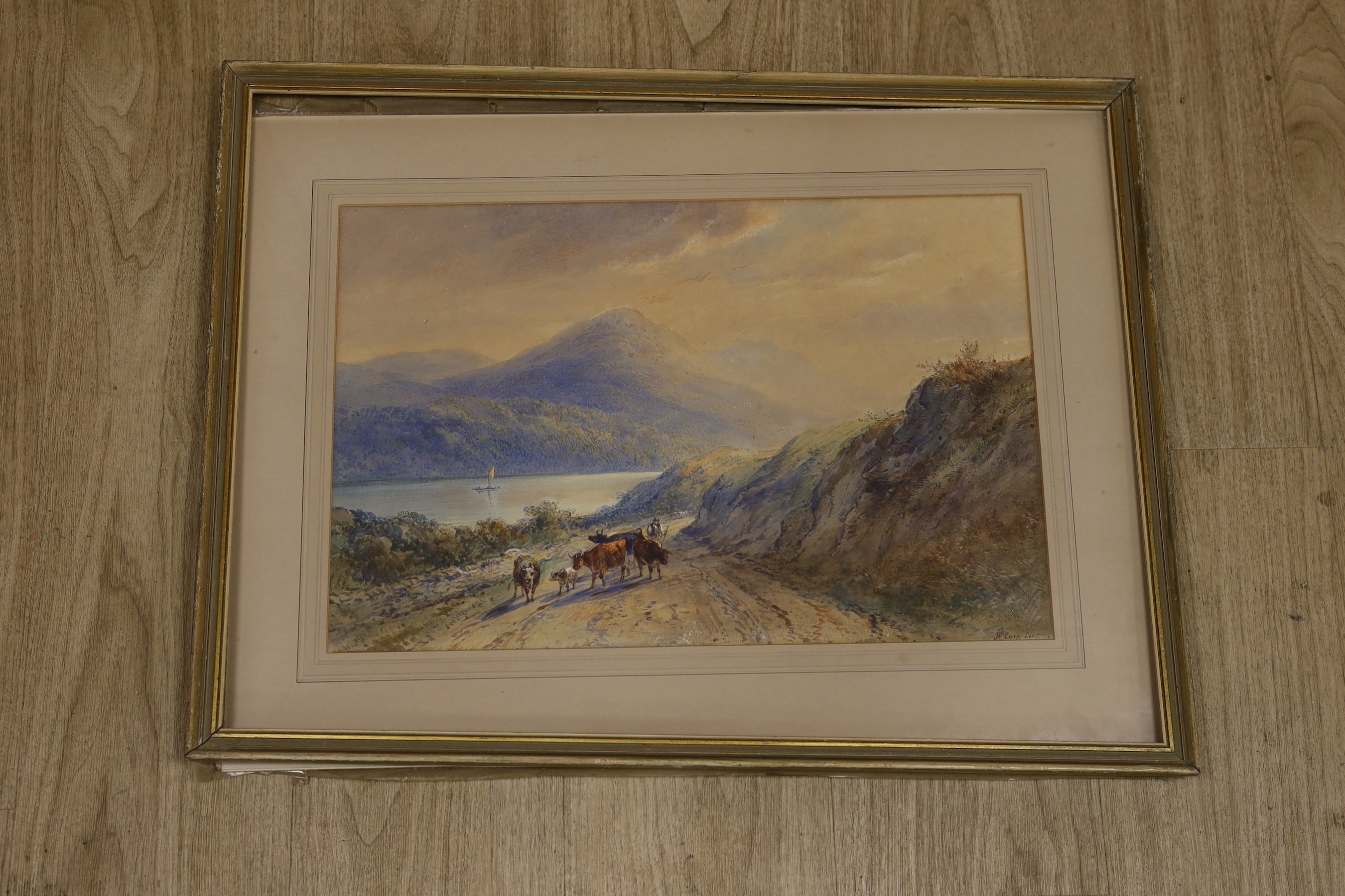 Henry Earp Snr (1831-1914), watercolour, Cattle drover passing a loch, signed, 33 x 49cm